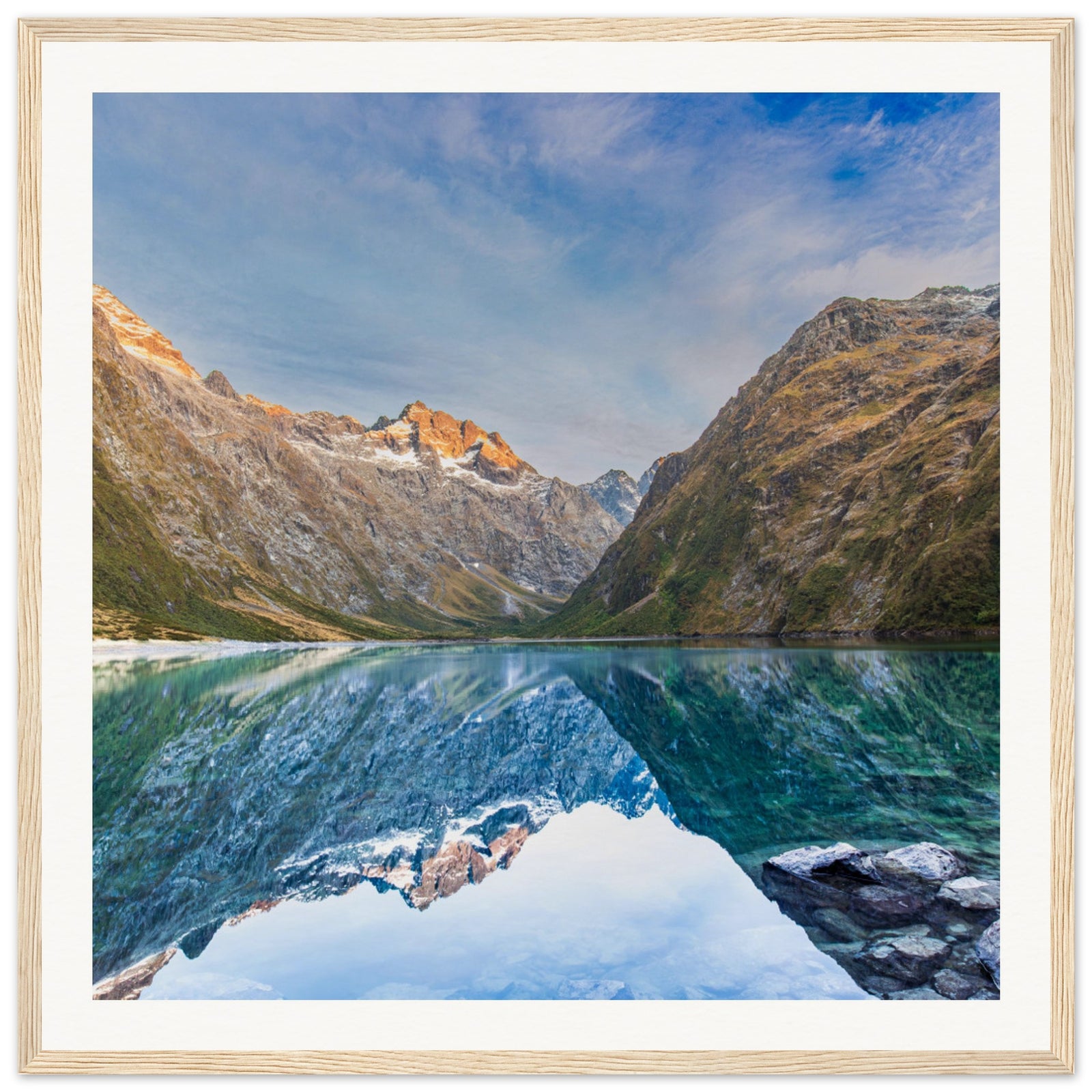 Portrait of mountain wilderness with water reflections and dot.