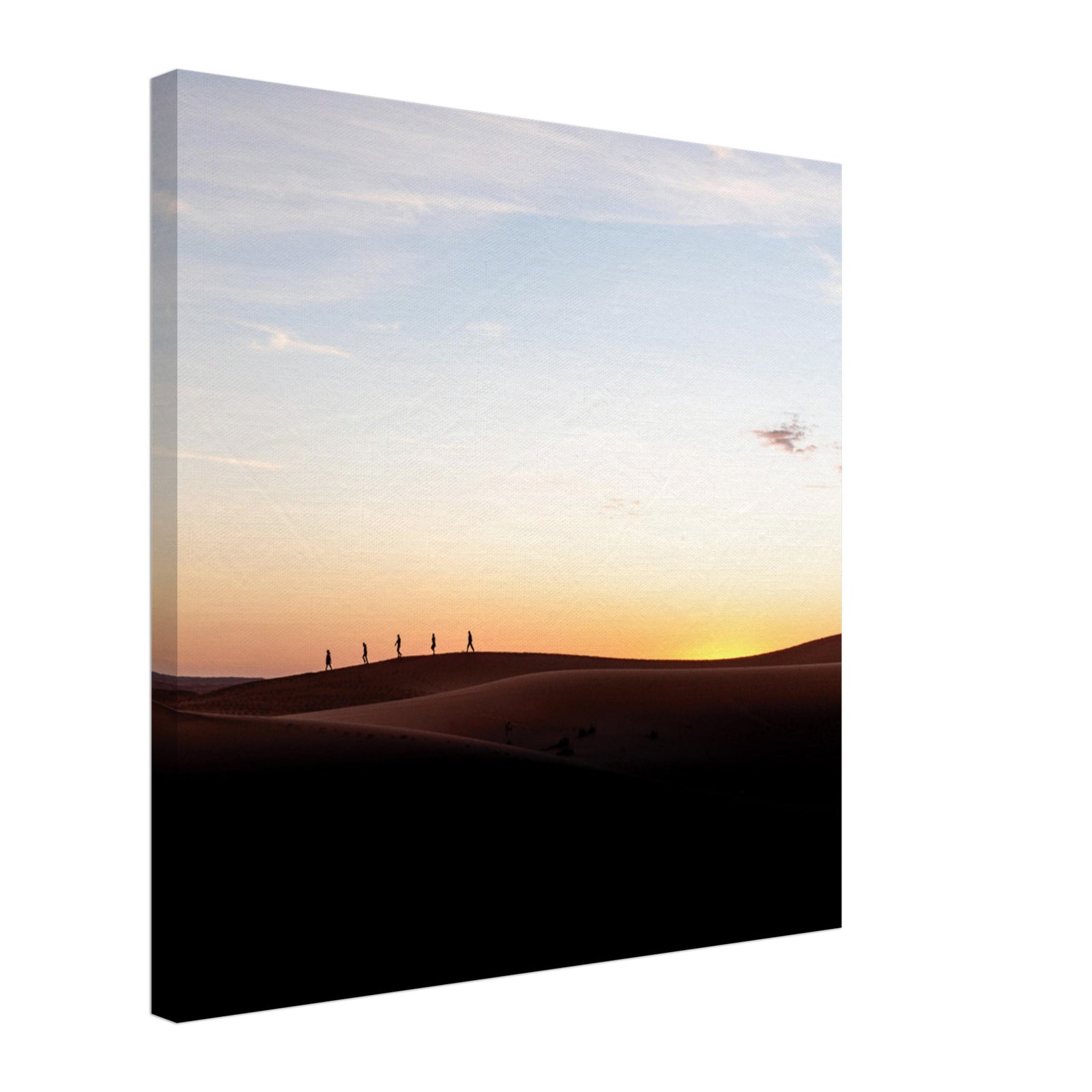 Soft sunset light over vast and empty dunes.