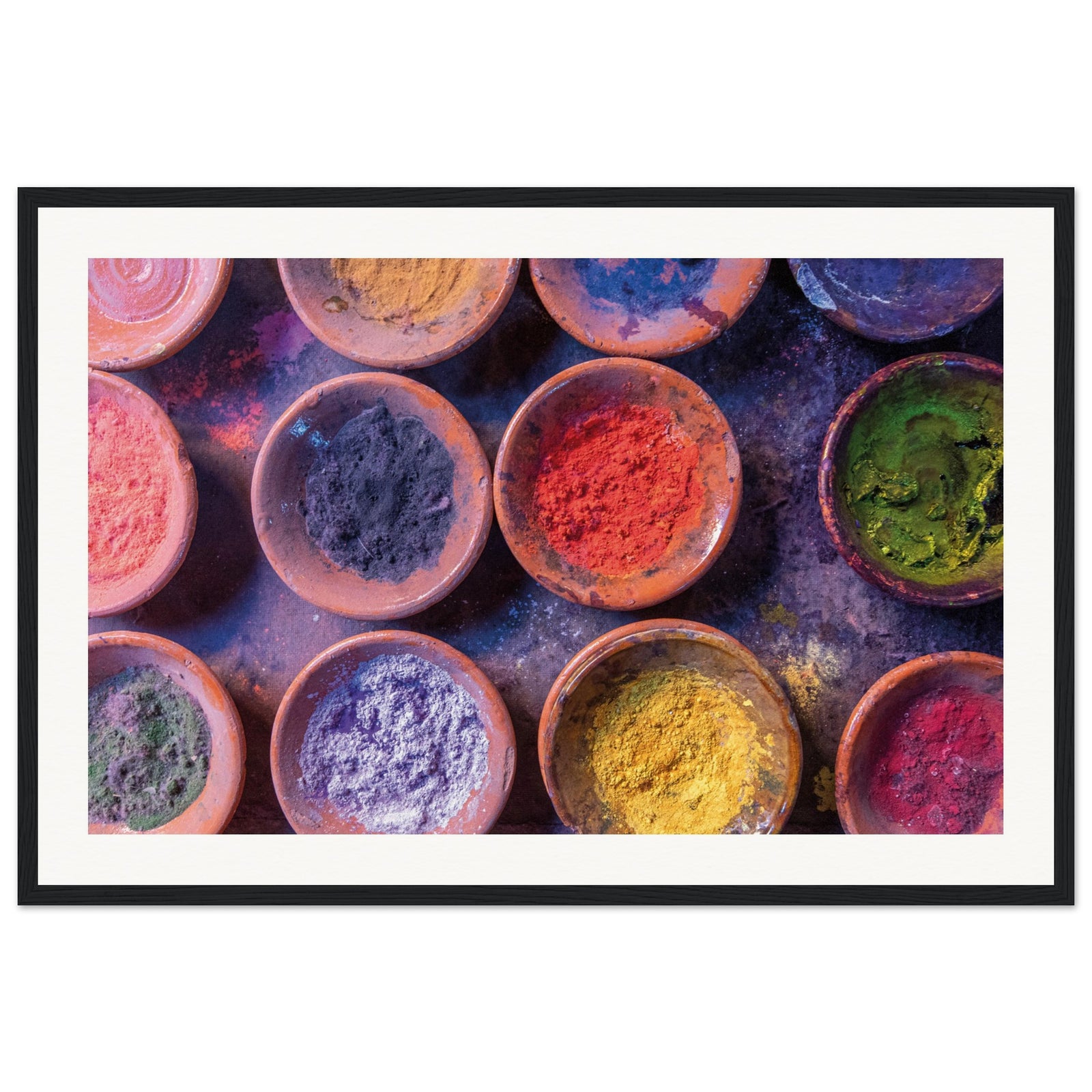 Top-down shot of artistic powders used in cultural traditions.