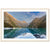 Portrait view of pristine waters and rugged mountains with a blue point.

