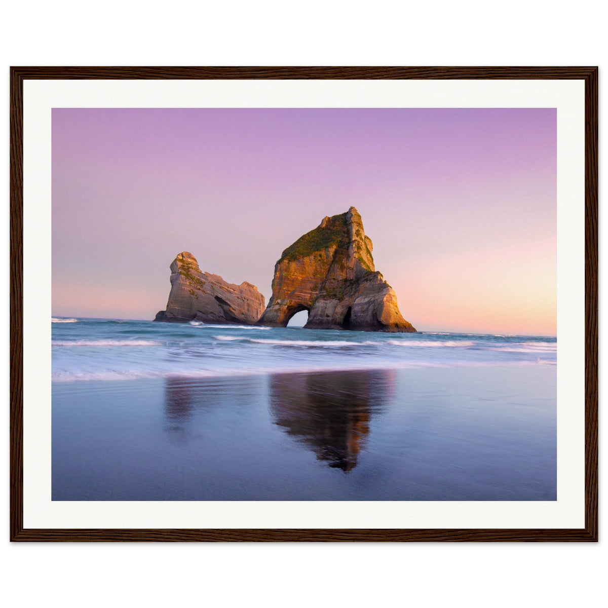 Dreamy seascape featuring a rock arch in pastel lighting.

