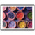 Framed photo of colorful festival powders in rustic round dishes.

