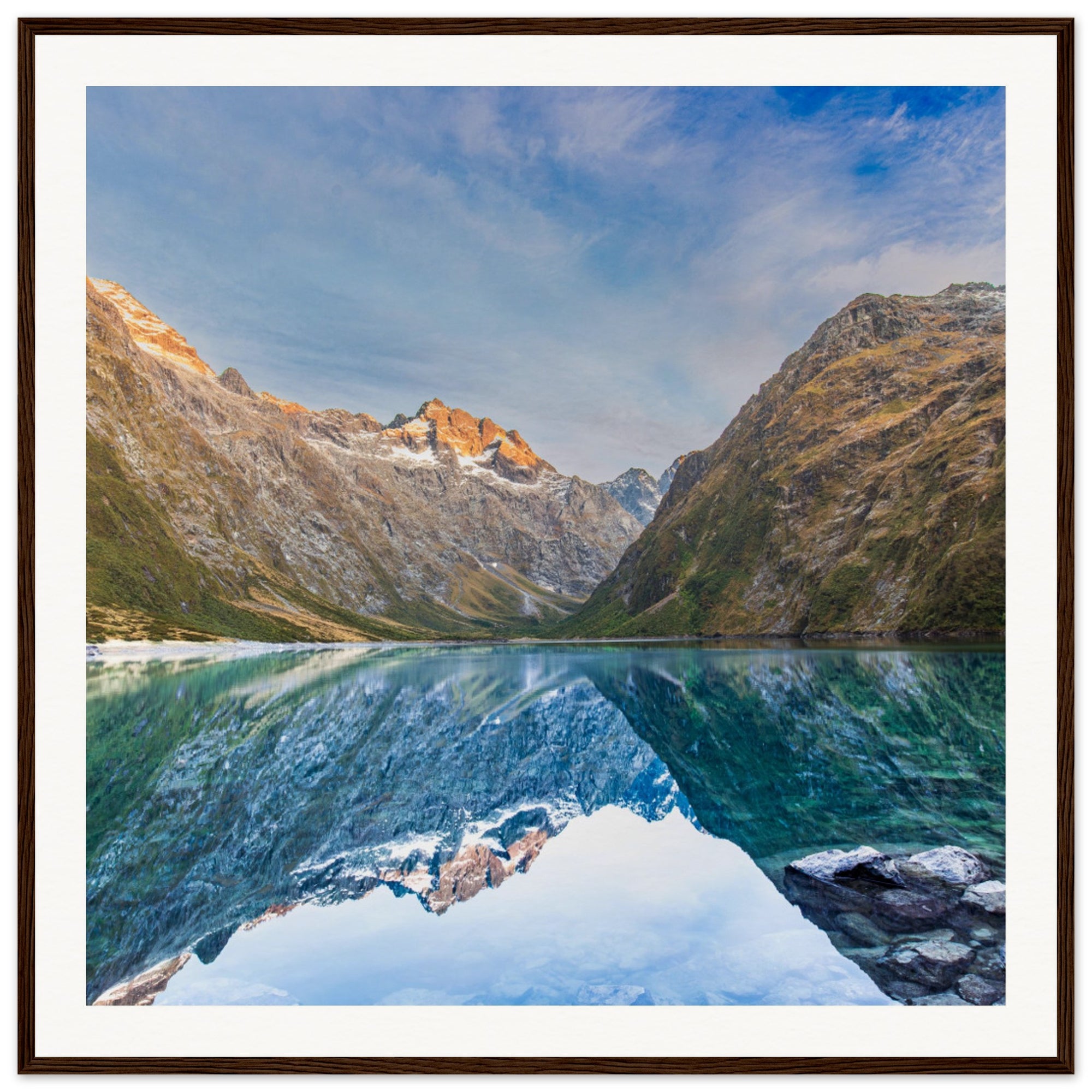 Nature wall art with glowing ridge and reflection, featuring a blue dot.

