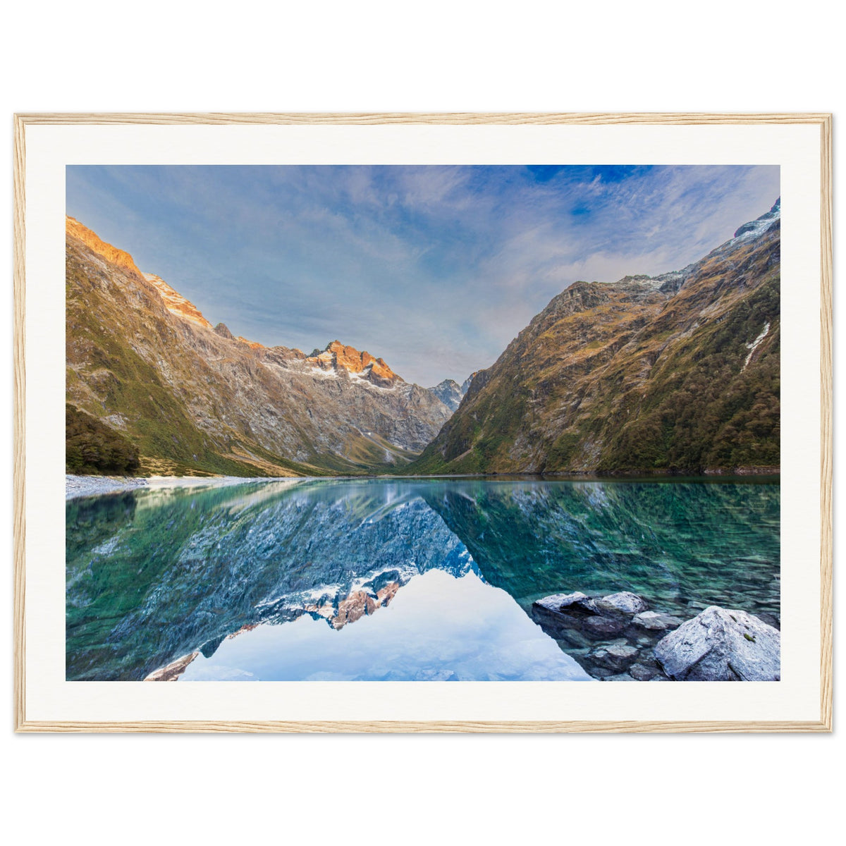 Wall portrait showing a tranquil lake and distant blue dot.

