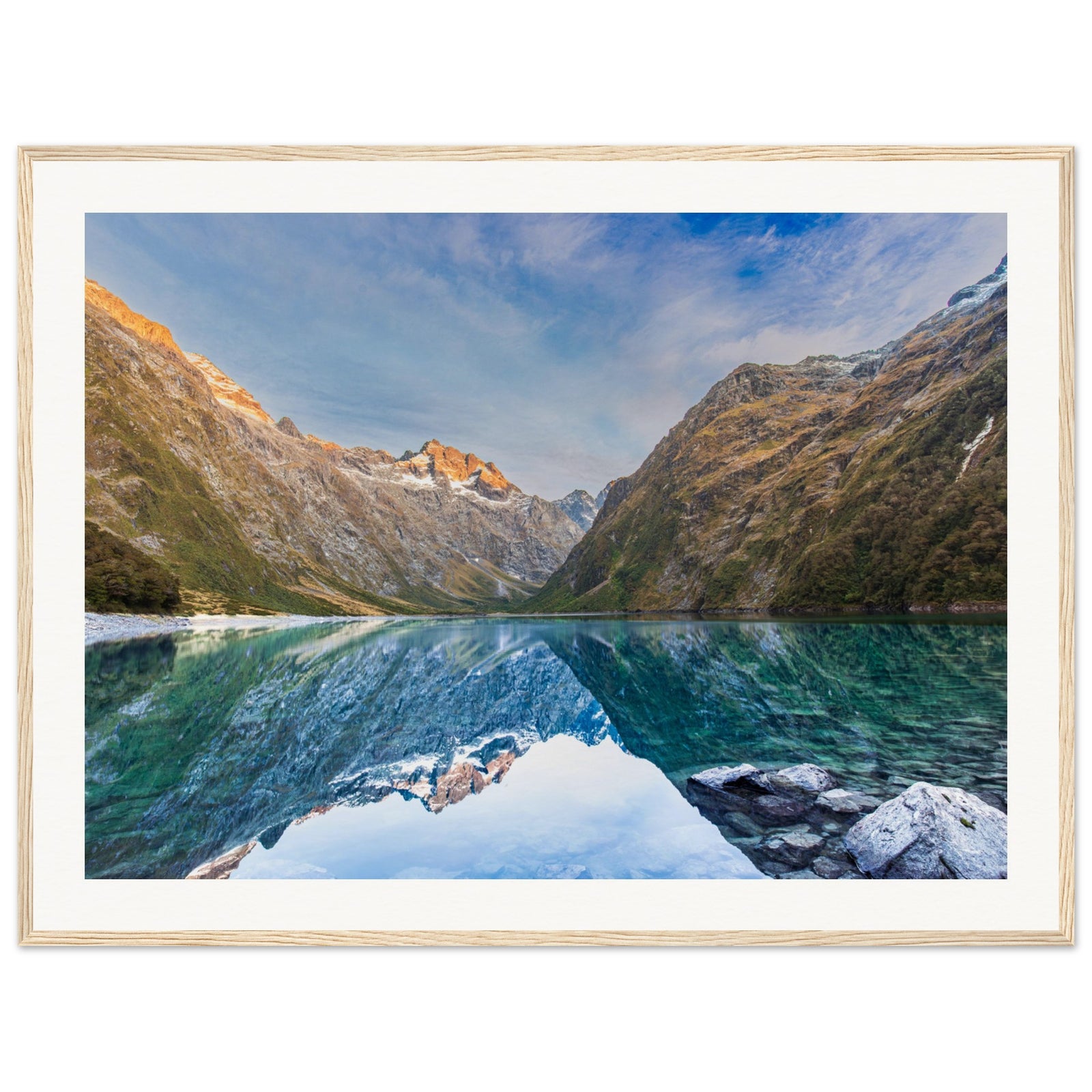 Wall portrait showing a tranquil lake and distant blue dot.


