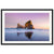 Framed vertical image of shoreline and sea rock at twilight.

