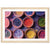 Pigment bowls arranged in a neat pattern in a framed portrait.

