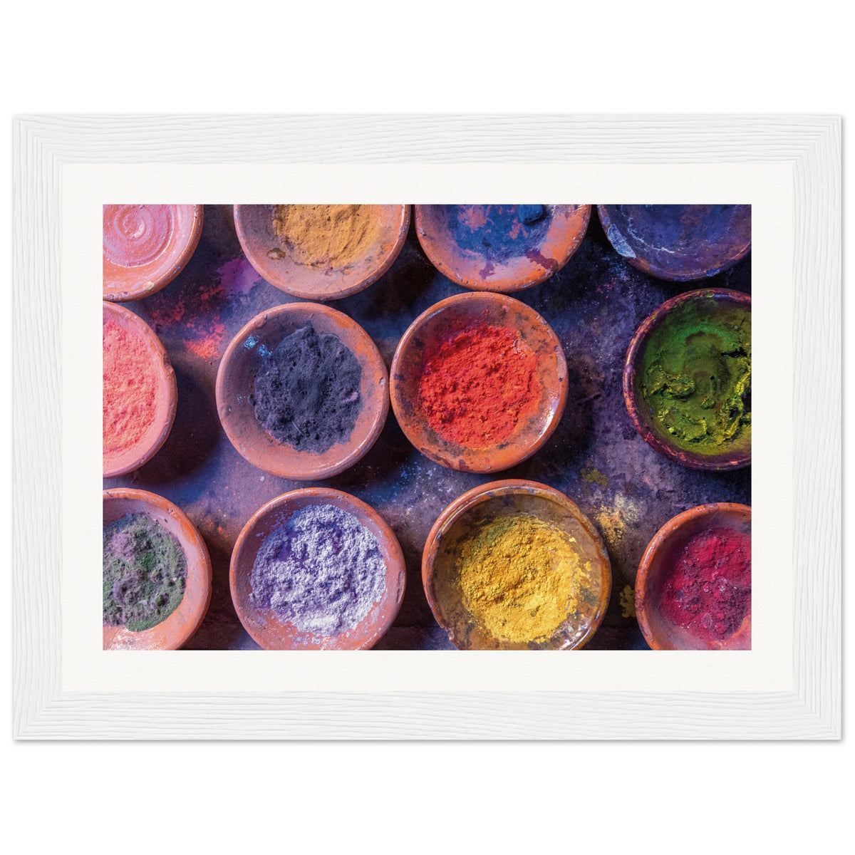 Framed artwork of traditional powdered pigments in neat formation.

