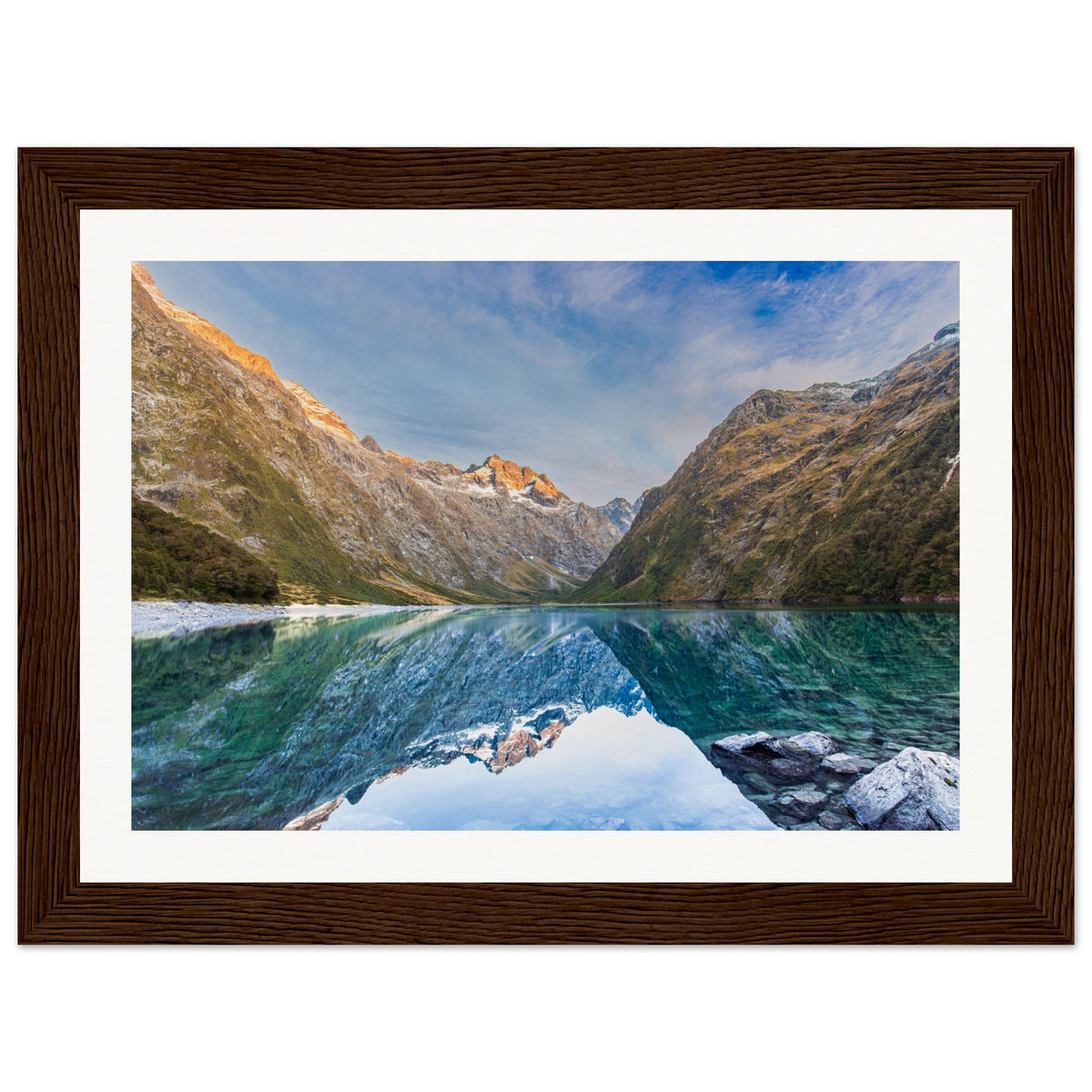 Vertical nature artwork showing mountain peaks and ridge marker.

