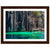 Framed nature portrait of clear turquoise water and rugged cliff face.

