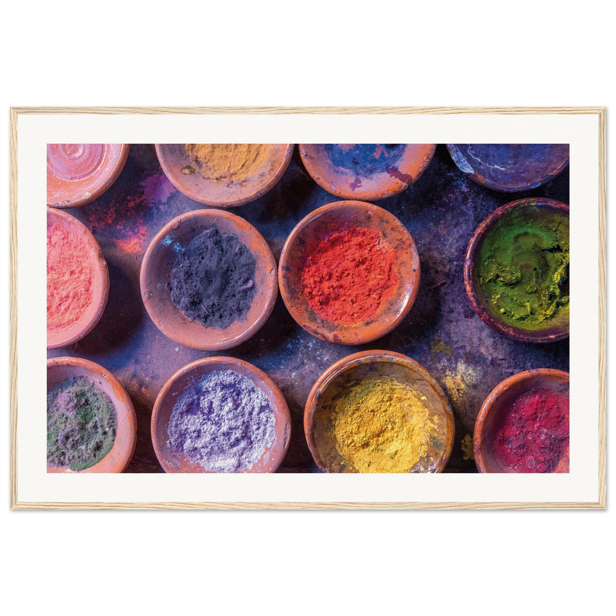 Framed decorative image of pigment powders used for celebration or art.

