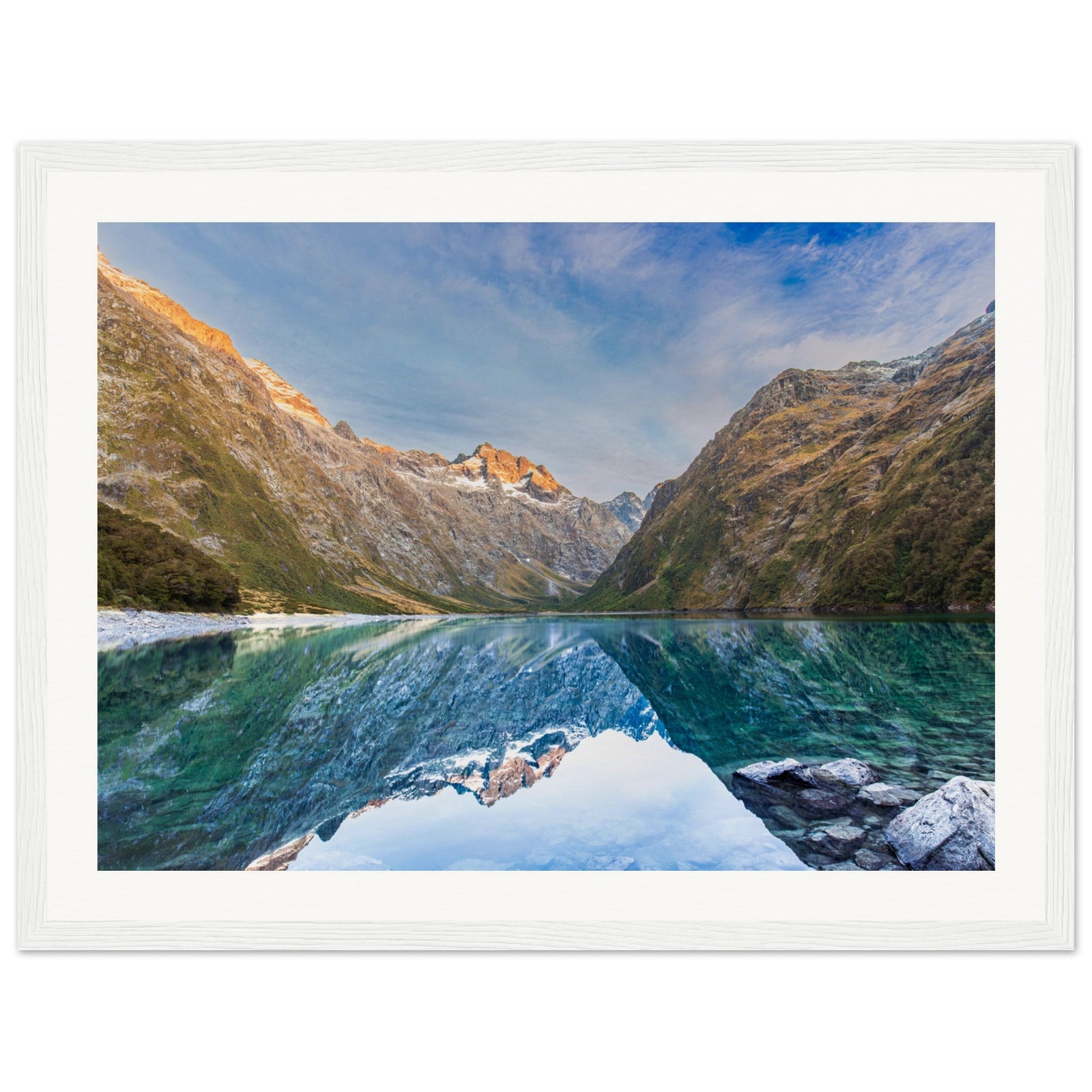 Mountain landscape portrait with reflection and blue dot.

