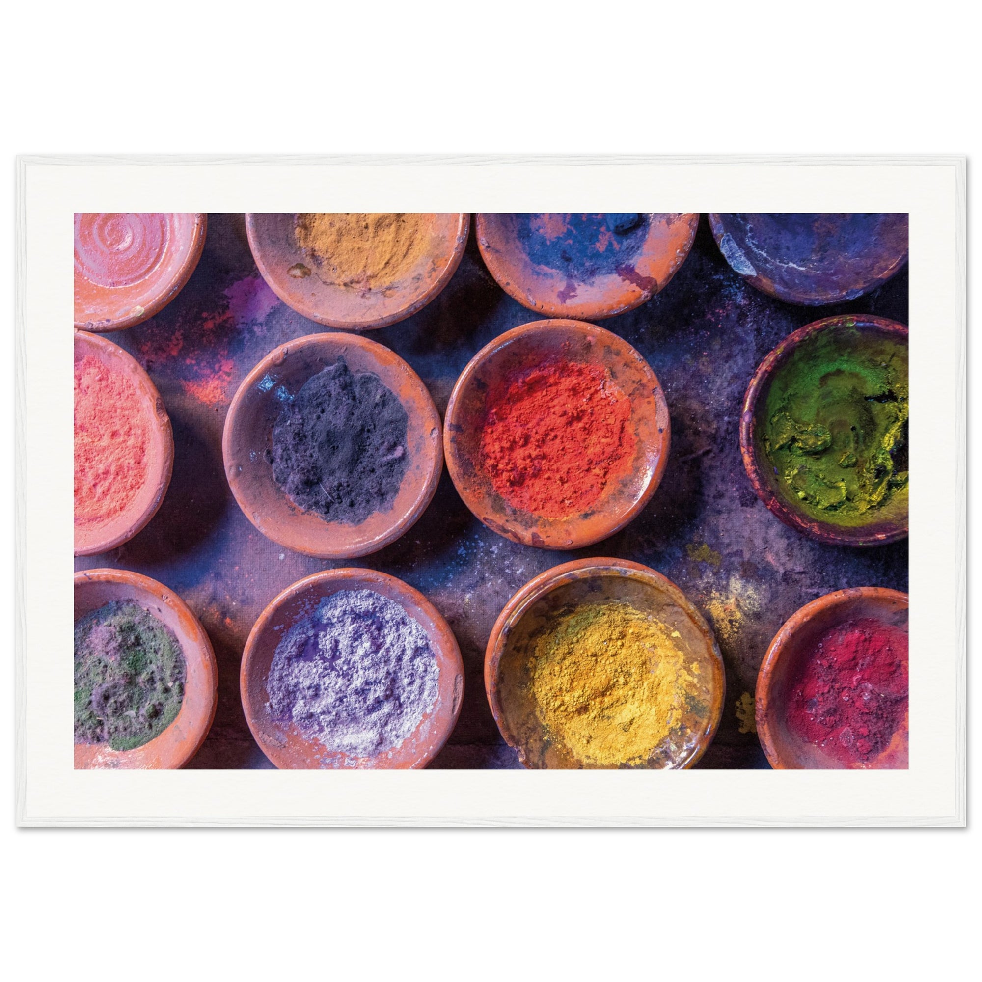 Terracotta bowls showcasing vibrant color palettes in framed art.

