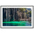 Steep rock face overlooking crystal-clear lagoon in vertical wall art.

