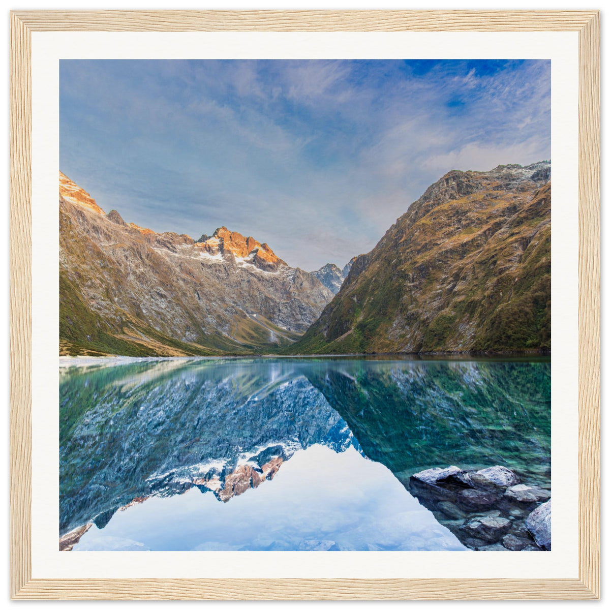 Portrait photo of alpine lake landscape with ridge detail.

