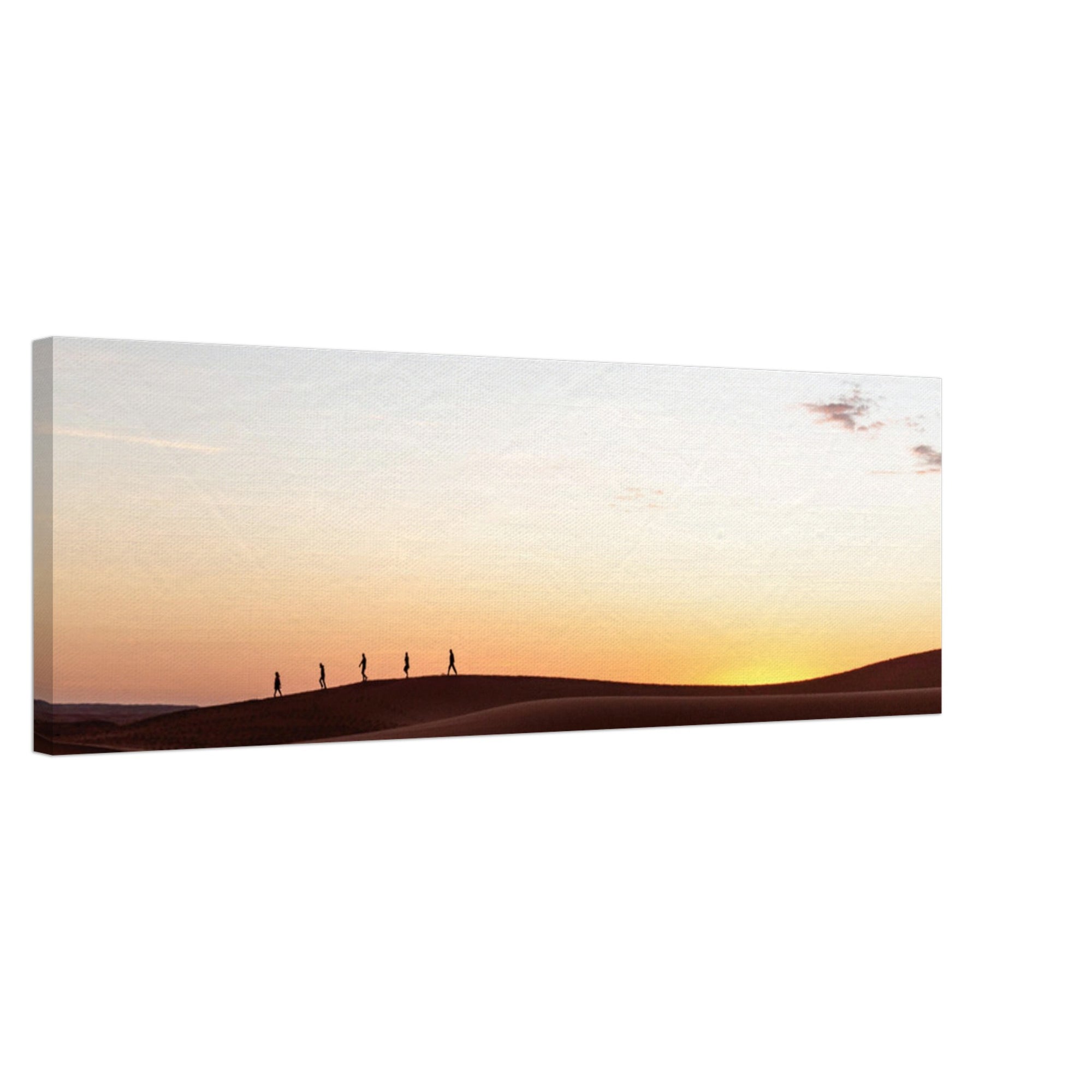 Distant hikers on sand dunes under a fading sun.

