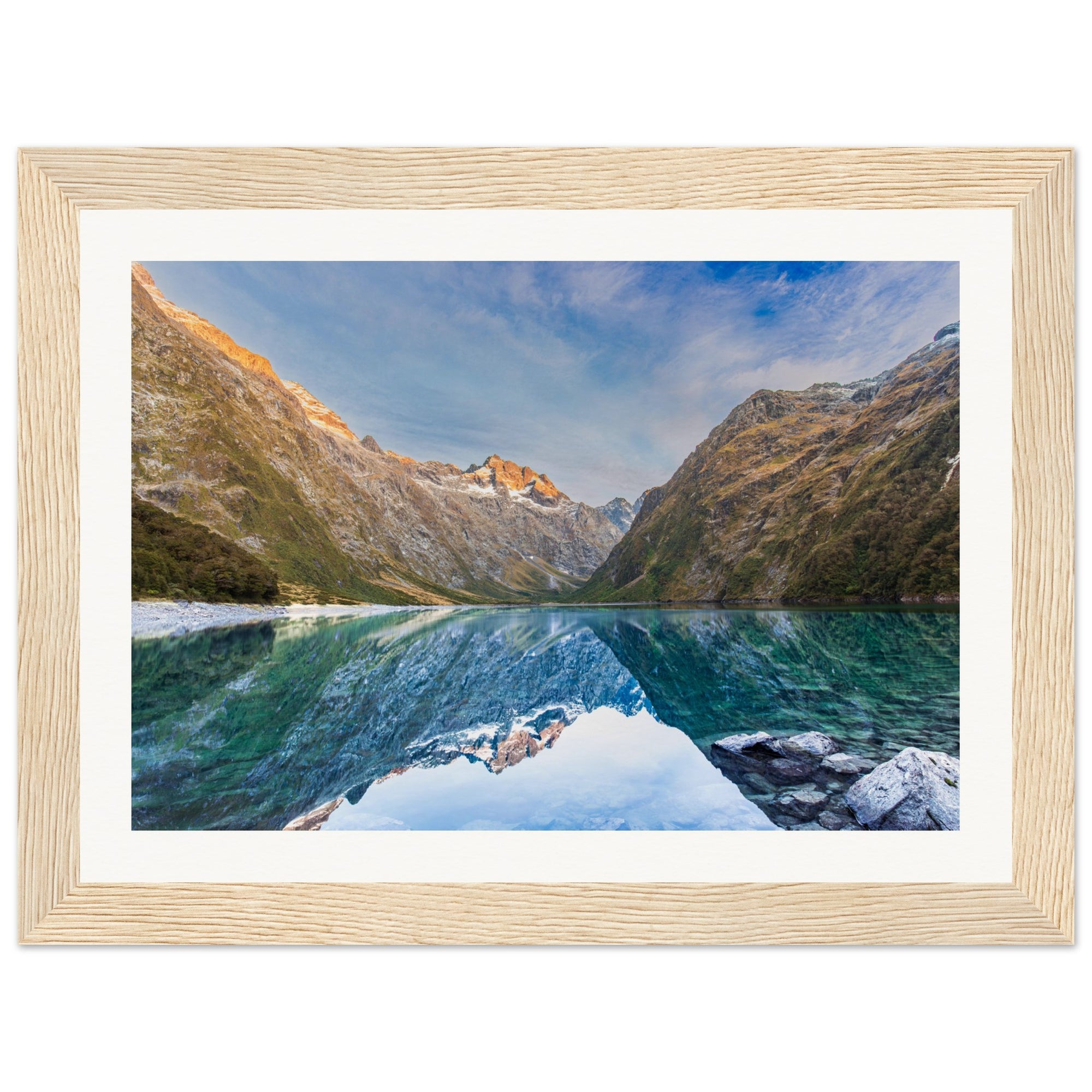 Vertical image of natural beauty with a blue dot on the sunlit slope.


