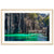 Serene tropical scene with boardwalk, cliffs, and crystal water.

