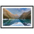 Framed portrait of a mountain lake scene with a blue dot on the slope.


