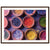 Rows of vibrant powders captured in a framed photograph.

