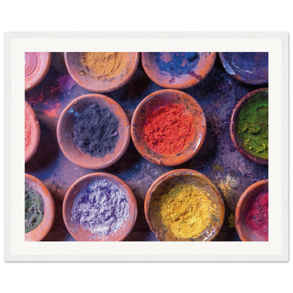 Artistic top-view of multi-colored powders for wall presentation.

