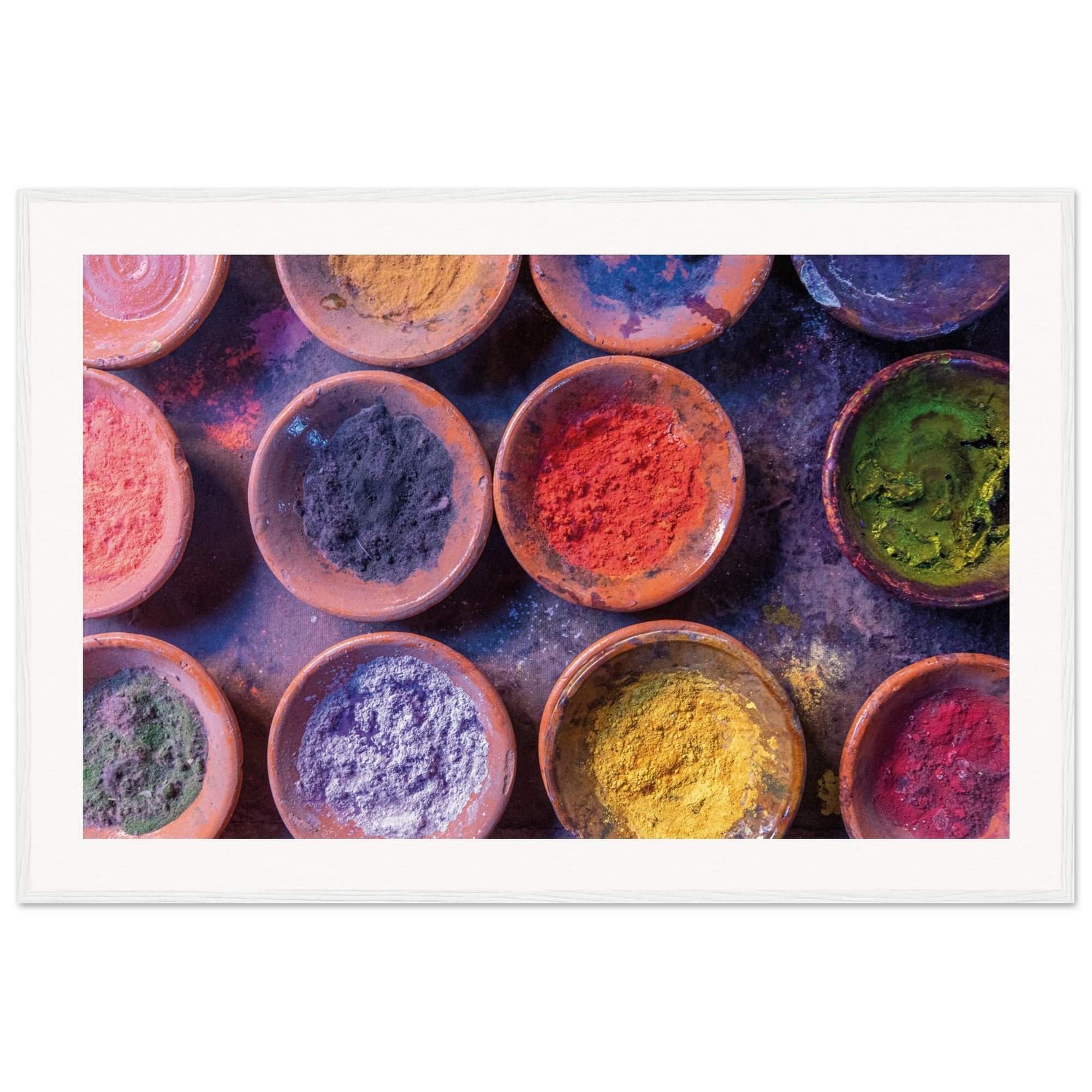Cultural celebration colors in rustic bowls framed for decor.

