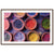 Artistic shot of natural pigment powders arranged in ceramic containers.

