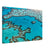 Heart-shaped coral in the middle of a blue sea.

