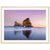 Dusk beach scene with reflective wet sand and sea stack.

