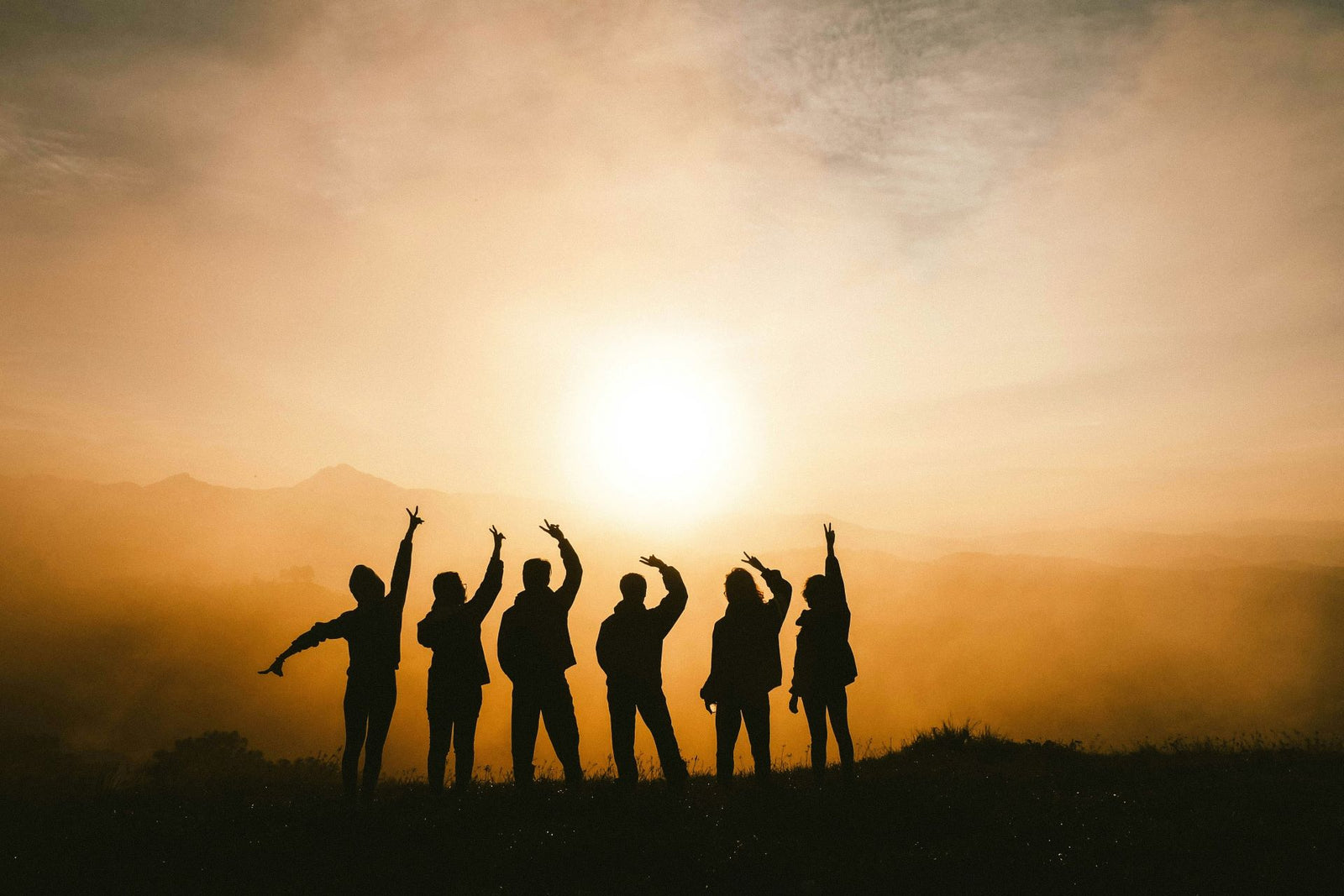 sunrise silhouette of friends