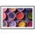 Symmetrical bowl pattern filled with vibrant powders in a framed view.

