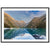 Landscape portrait featuring crystal lake and sunlit mountain.

