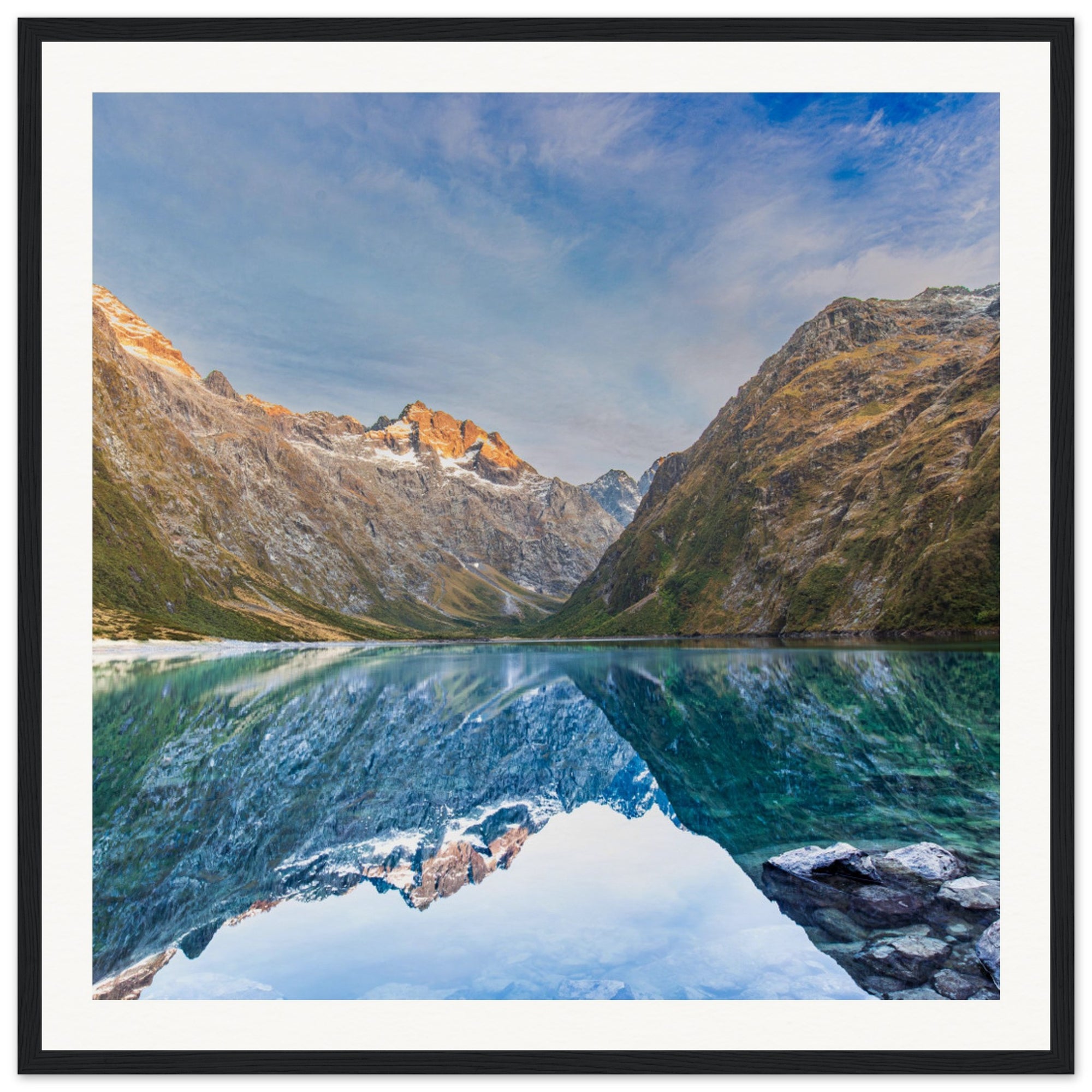Vertical wall art showing a mountain view and a blue dot detail.