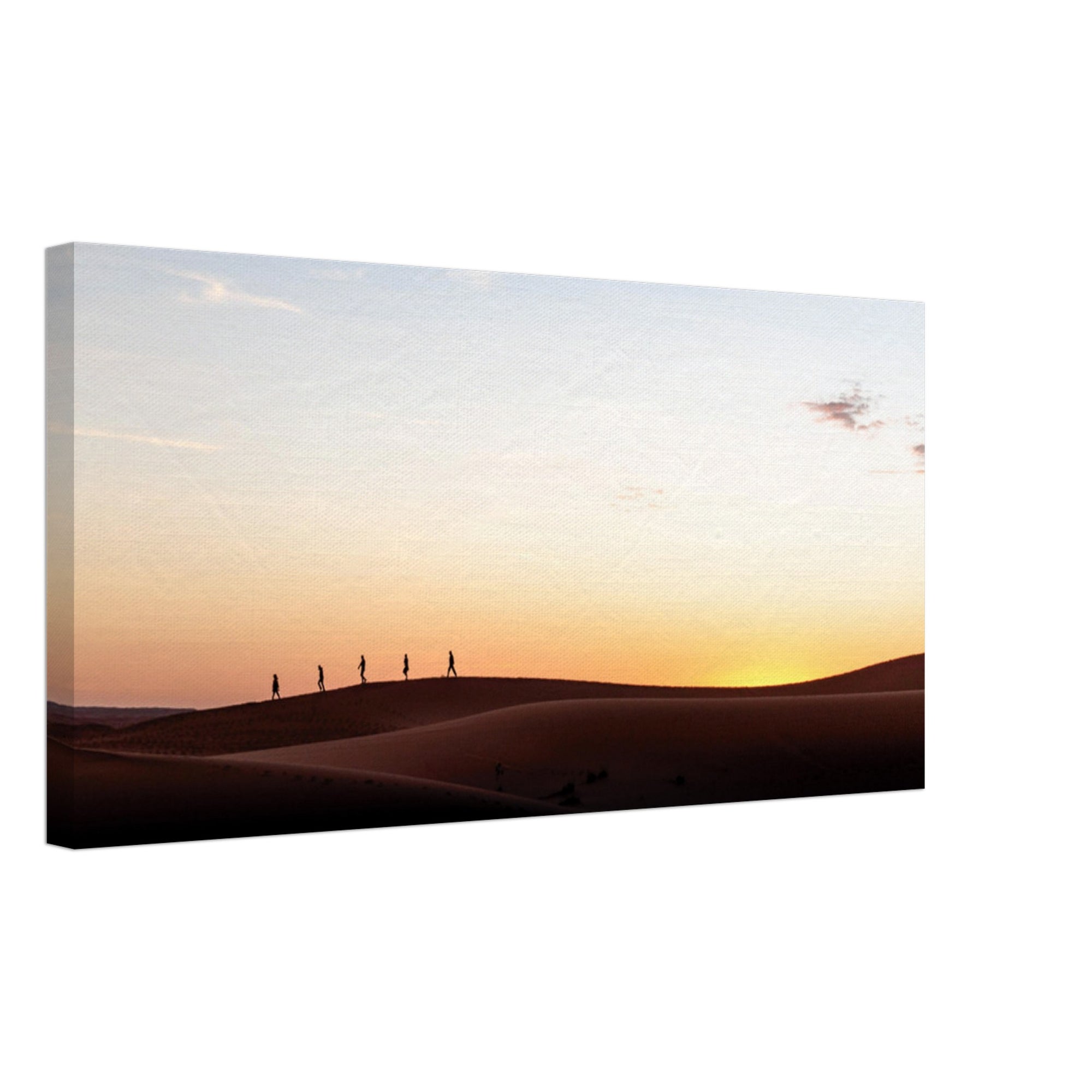Golden desert landscape with people in silhouette.

