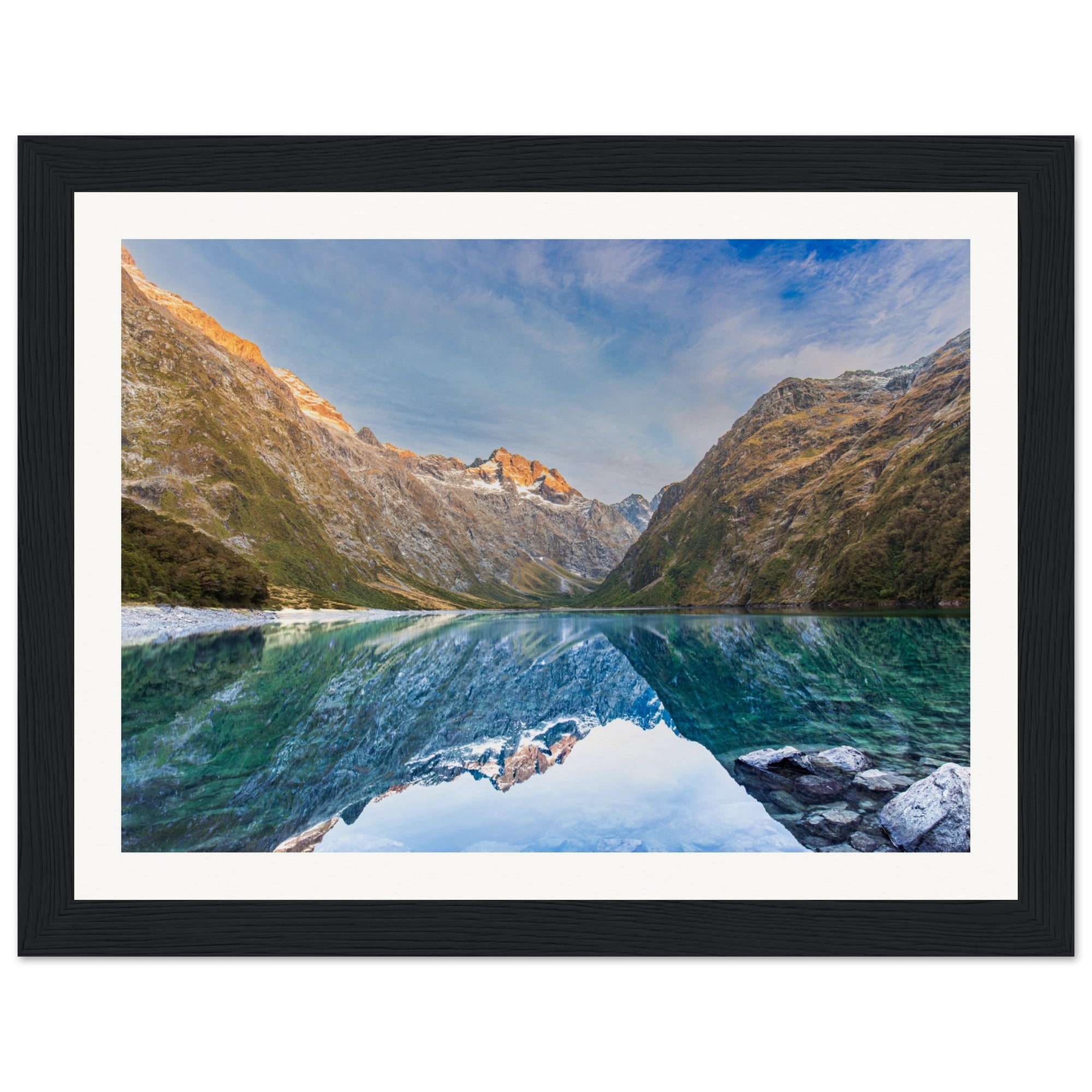 Portrait-oriented nature scene with a highlighted ridge.

