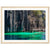 Cliffside walkway and glowing green lagoon captured in wall art.


