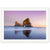 Seaside arch formation in warm light captured in a portrait.

