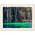 Framed vertical shot of clear water and jagged rock formations.

