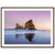 Framed beach landscape of natural rock formations at sunset.


